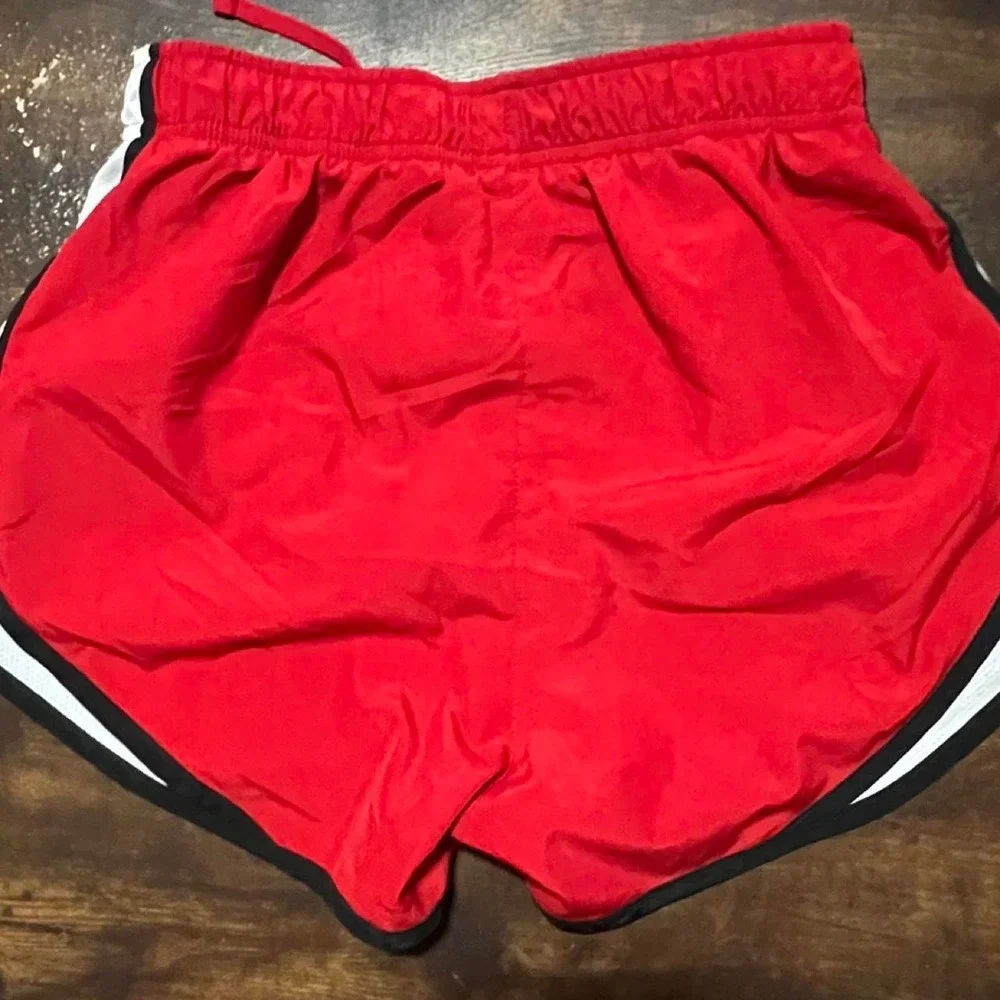Nike red shorts with white/black side panels, size XS 427.5